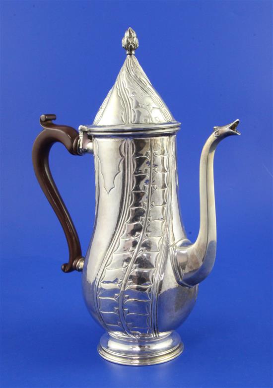 A 1930s Arts & Crafts silver coffee pot by Thomas Capel Walton Smith, gross 23.5 oz.